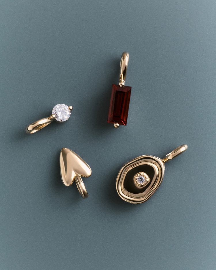LUCENT DIAMOND CHARM (9K GOLD)